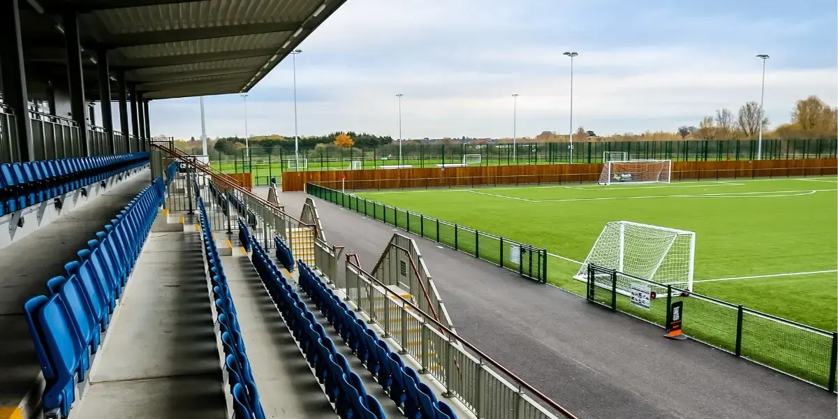 Football stand, pitch and goals