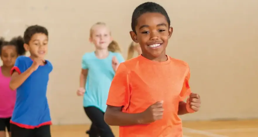 Children having fun in sports hall